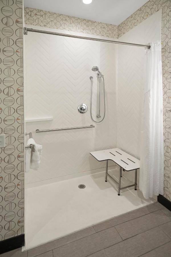 King Room - Hearing Accessible - Roll-in Shower at Holiday Inn & Suites Decatur-Forsyth by IHG
