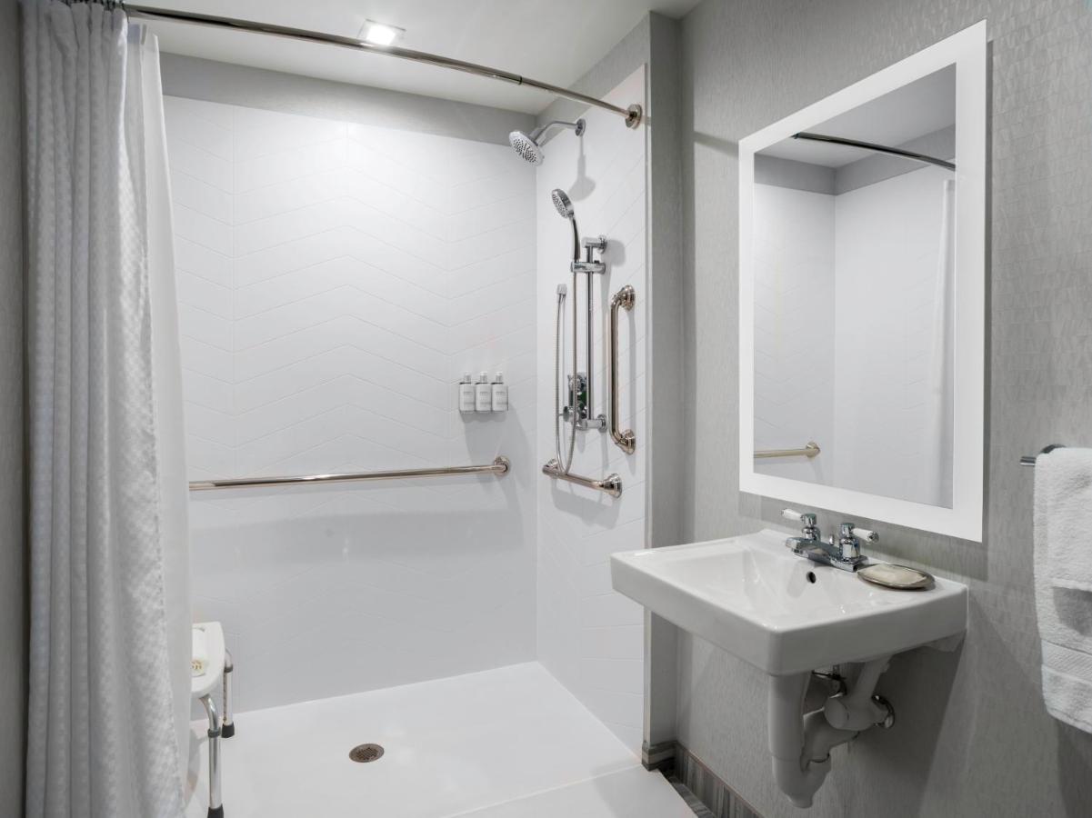 King Room with Communications Mobility Accessible Roll-In Shower at voco Niagara Falls - The Cadence by IHG