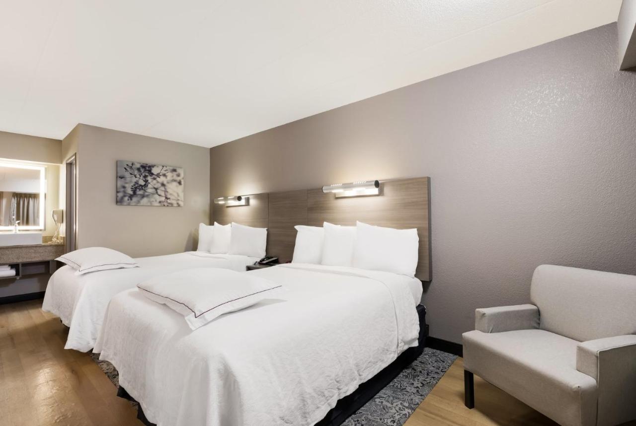 Premium Room with Two Double Beds Smoke Free (Upgraded Bedding & Snack) at Red Roof Inn PLUS+ Chicago - Naperville