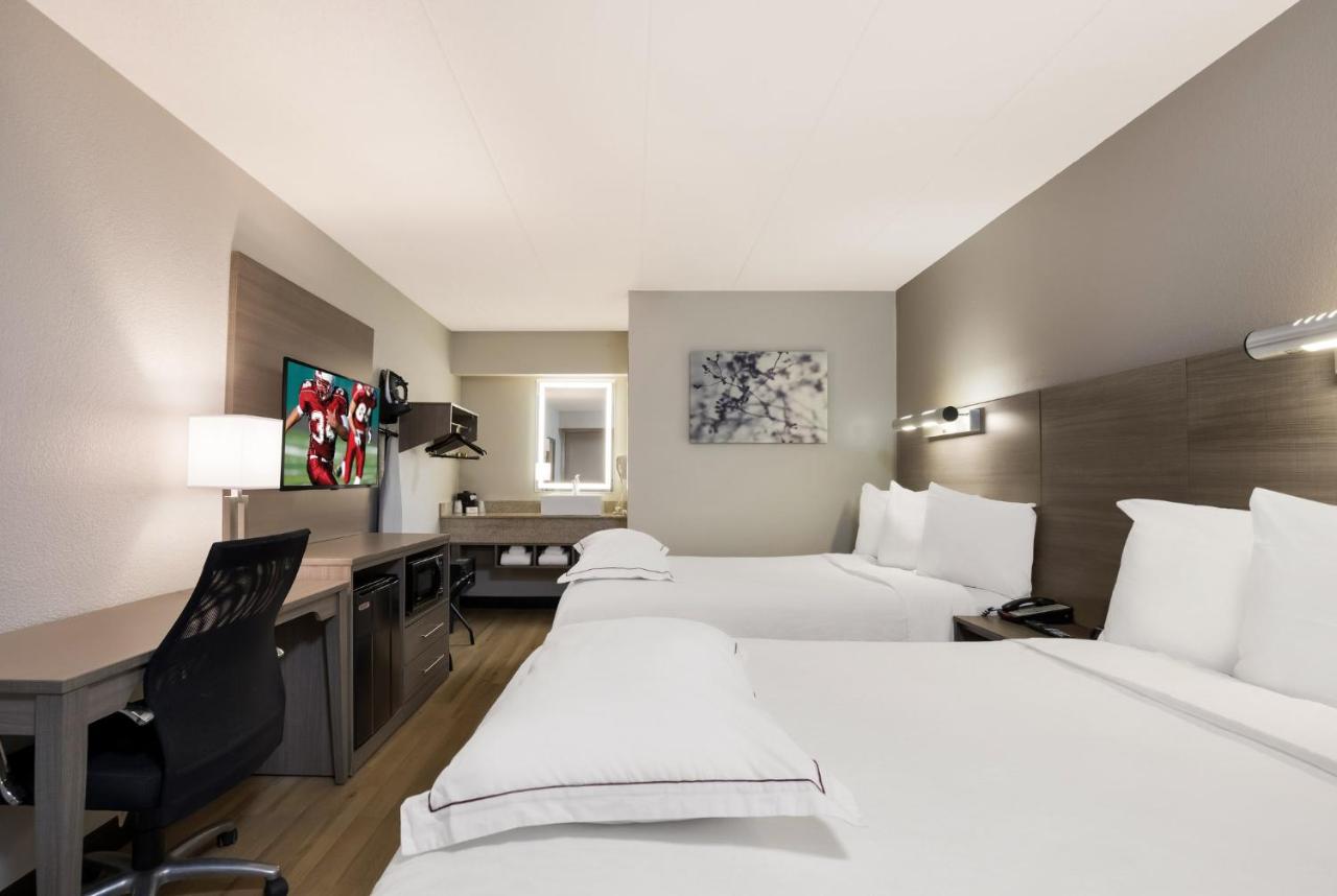 Premium Room with Two Double Beds Smoke Free (Upgraded Bedding & Snack) at Red Roof Inn PLUS+ Chicago - Naperville