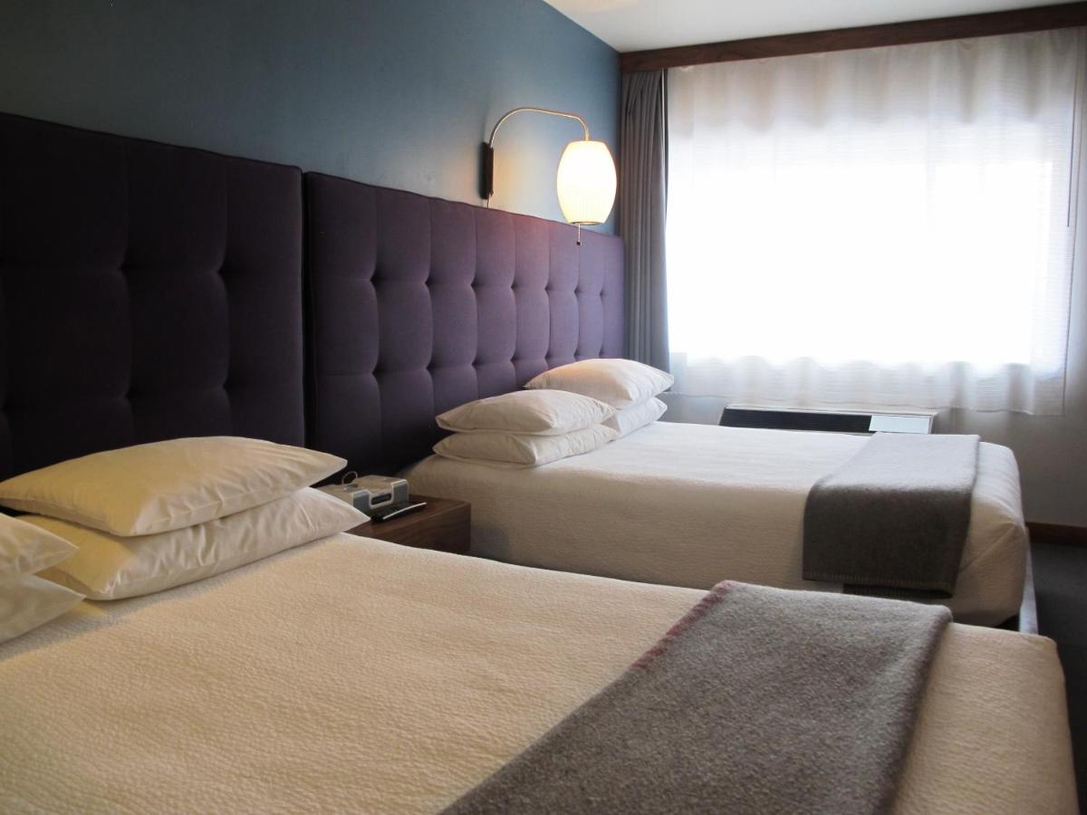 Queen Room with Two Queen Beds at Modern Hotel