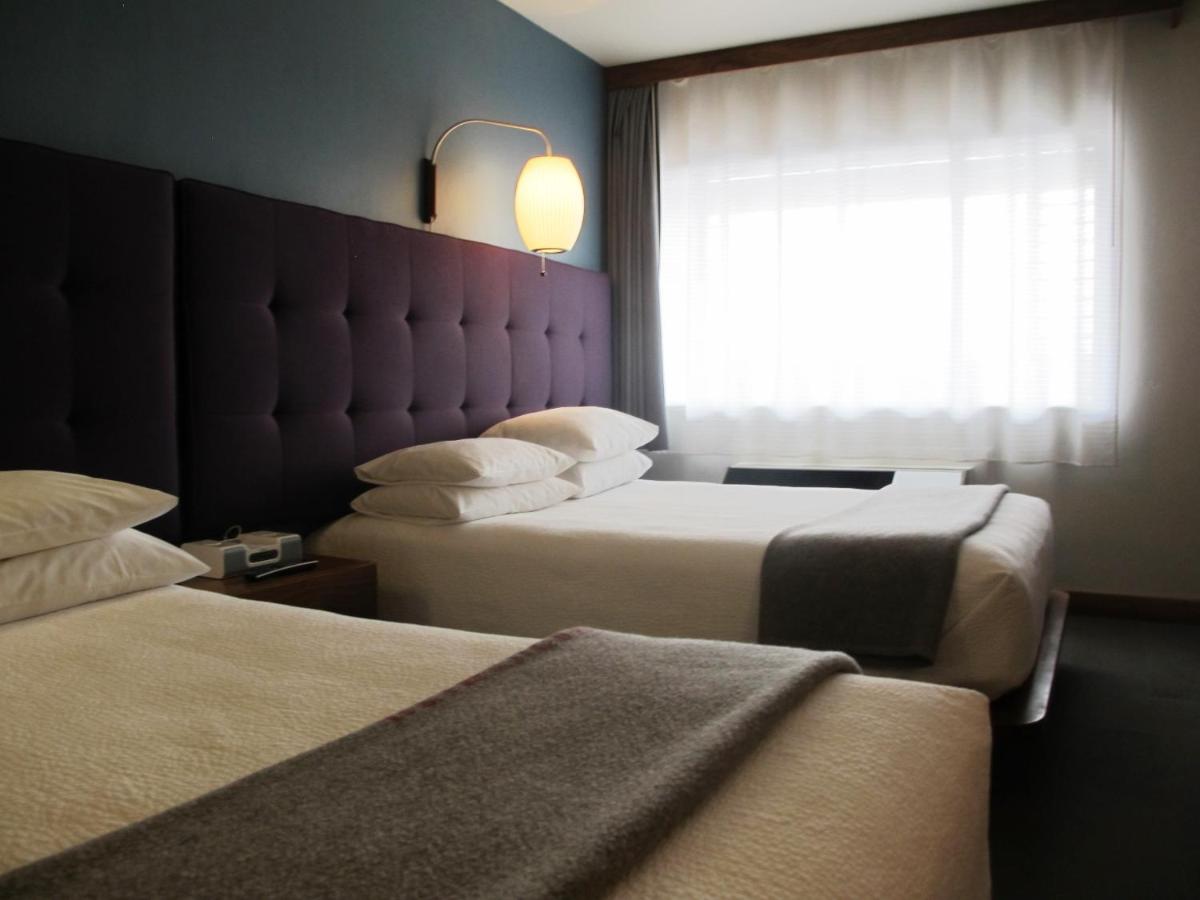 Queen Room with Two Queen Beds at Modern Hotel