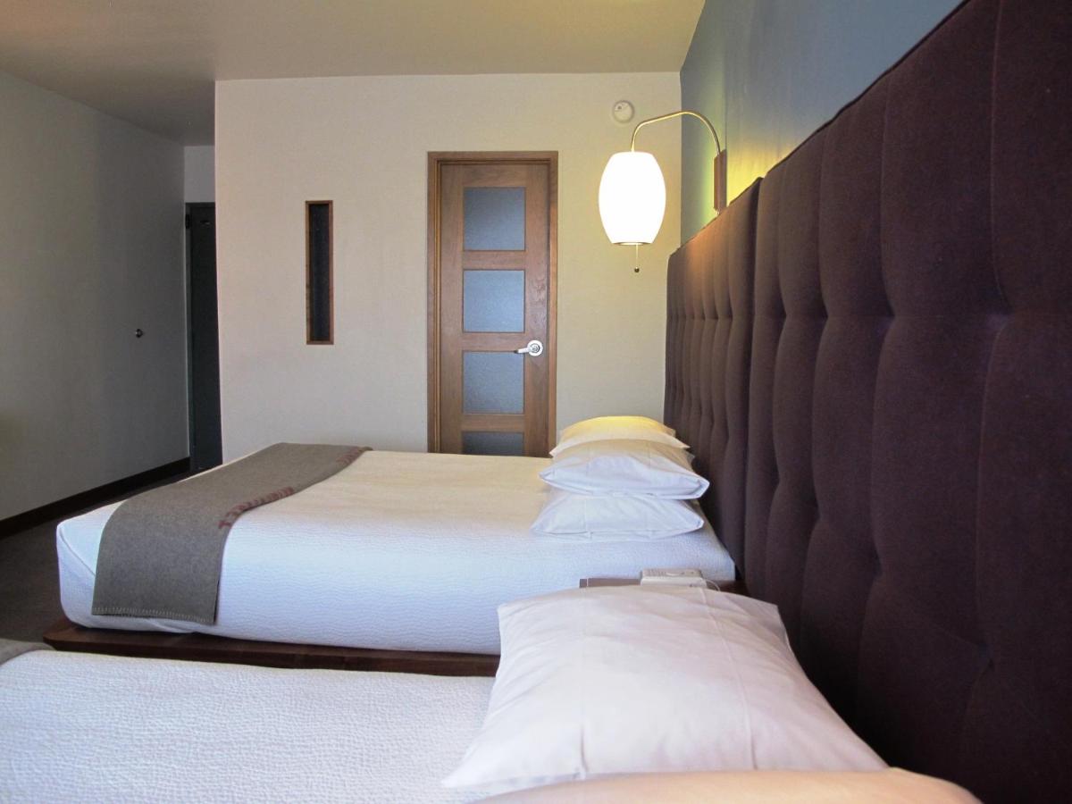 Queen Room with Two Queen Beds at Modern Hotel