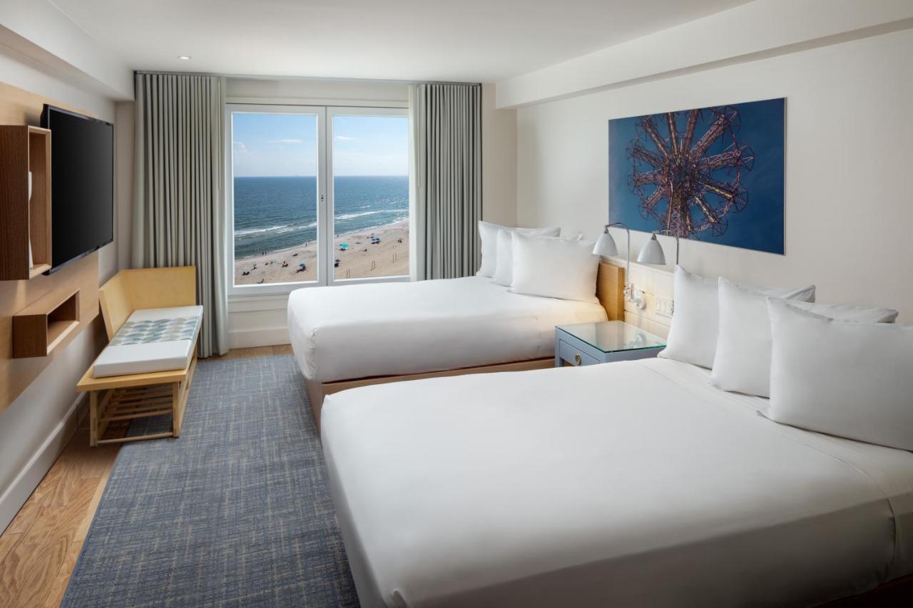 2 Double Beds Oceanfront View with Roll In Shower at Allegria Hotel