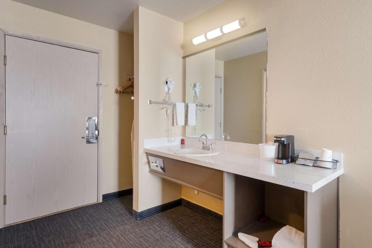 Queen Room with Two Queen Beds and Sofa Bed - Non-Smoking at SureStay Hotel by Best Western Wells