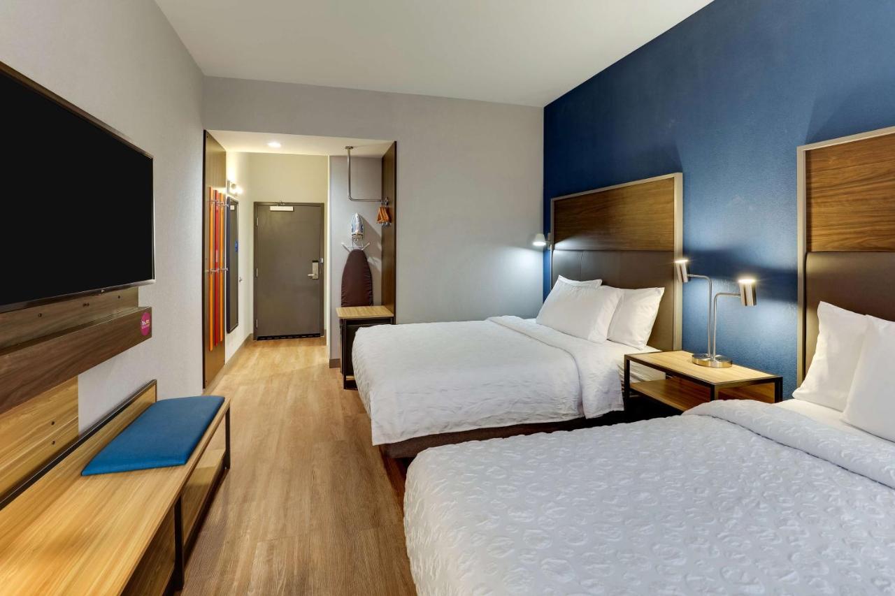 Queen Room with Two Queen Beds and Walk In Shower at Tru By Hilton Raleigh Garner
