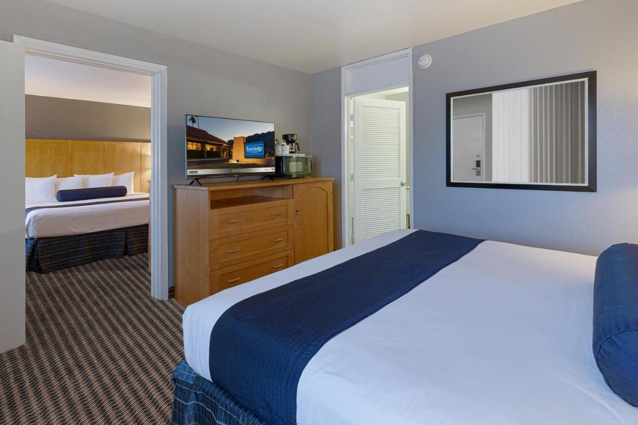 King Suite with One King and One Queen Bed - Non-Smoking at Travelodge by Wyndham Palm Springs
