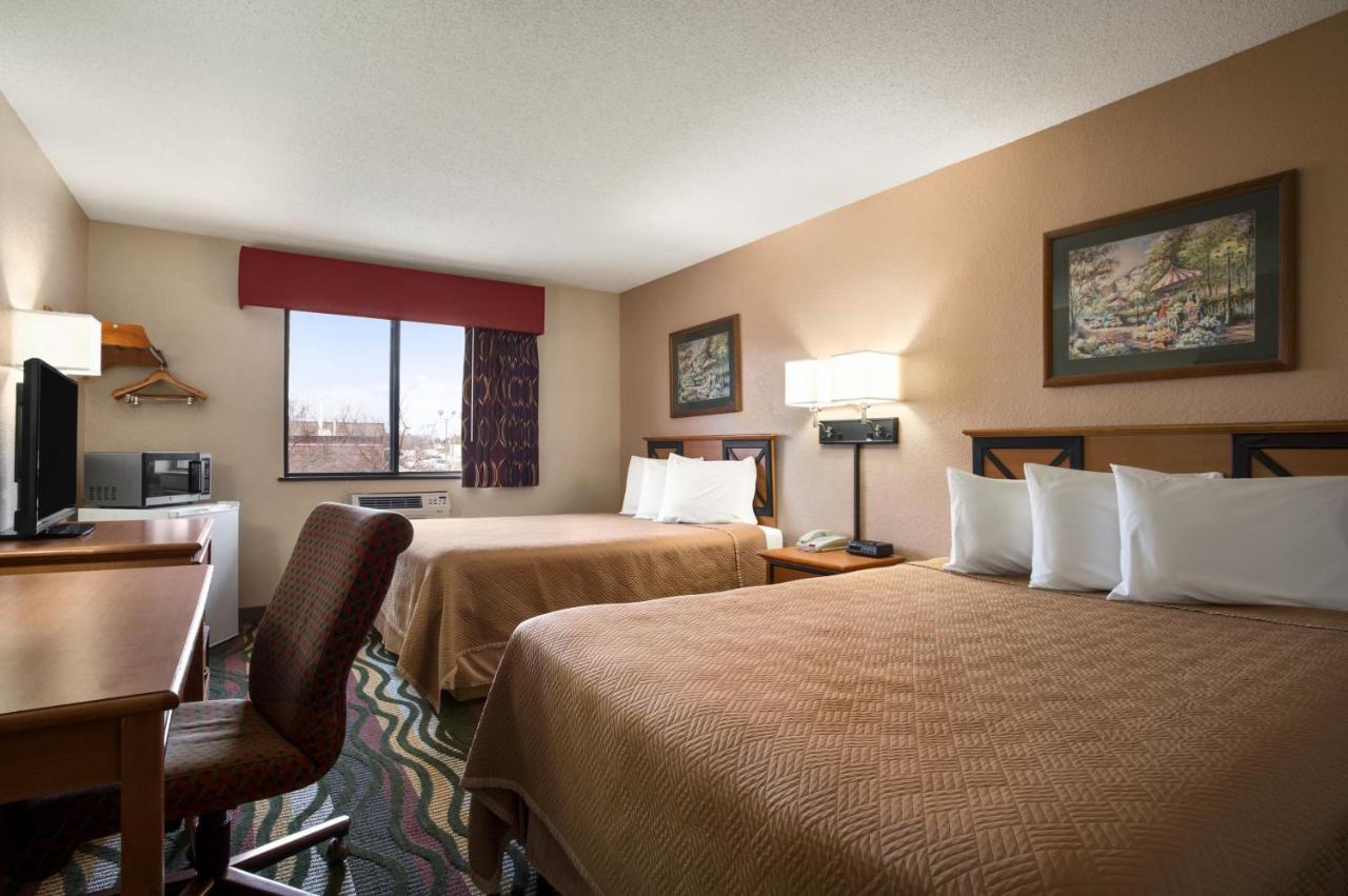 Queen Room with Two Queen Beds - Non-Smoking at Travelodge by Wyndham Battle Creek