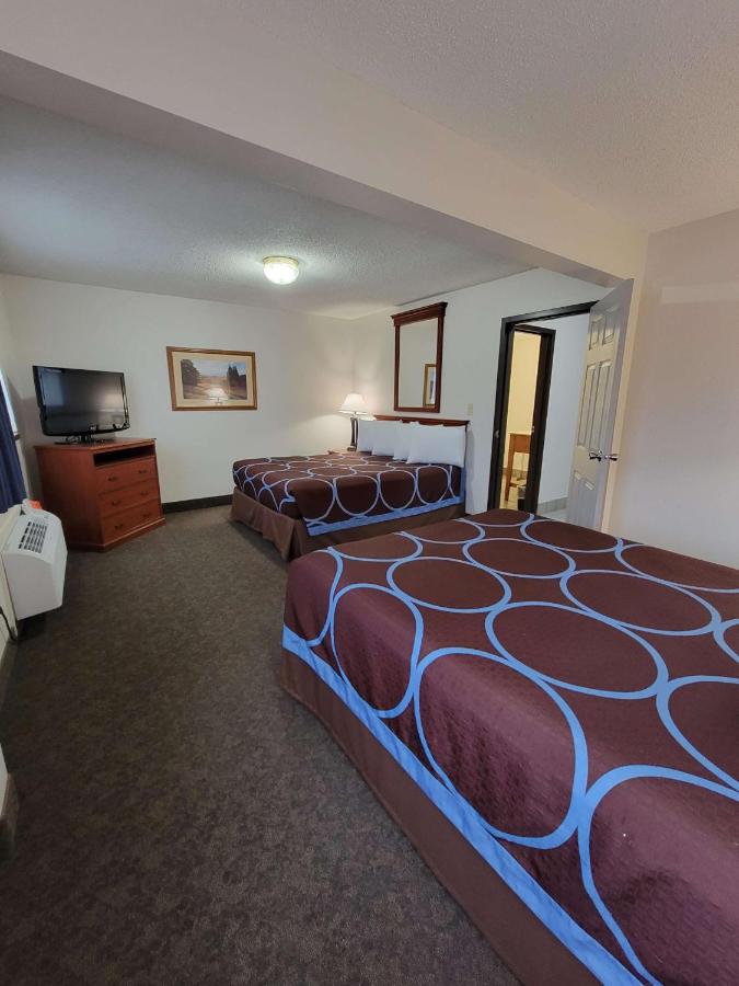 Queen Room with Three Queen Beds - Non-Smoking at SureStay Plus Hotel by Best Western Grand Island