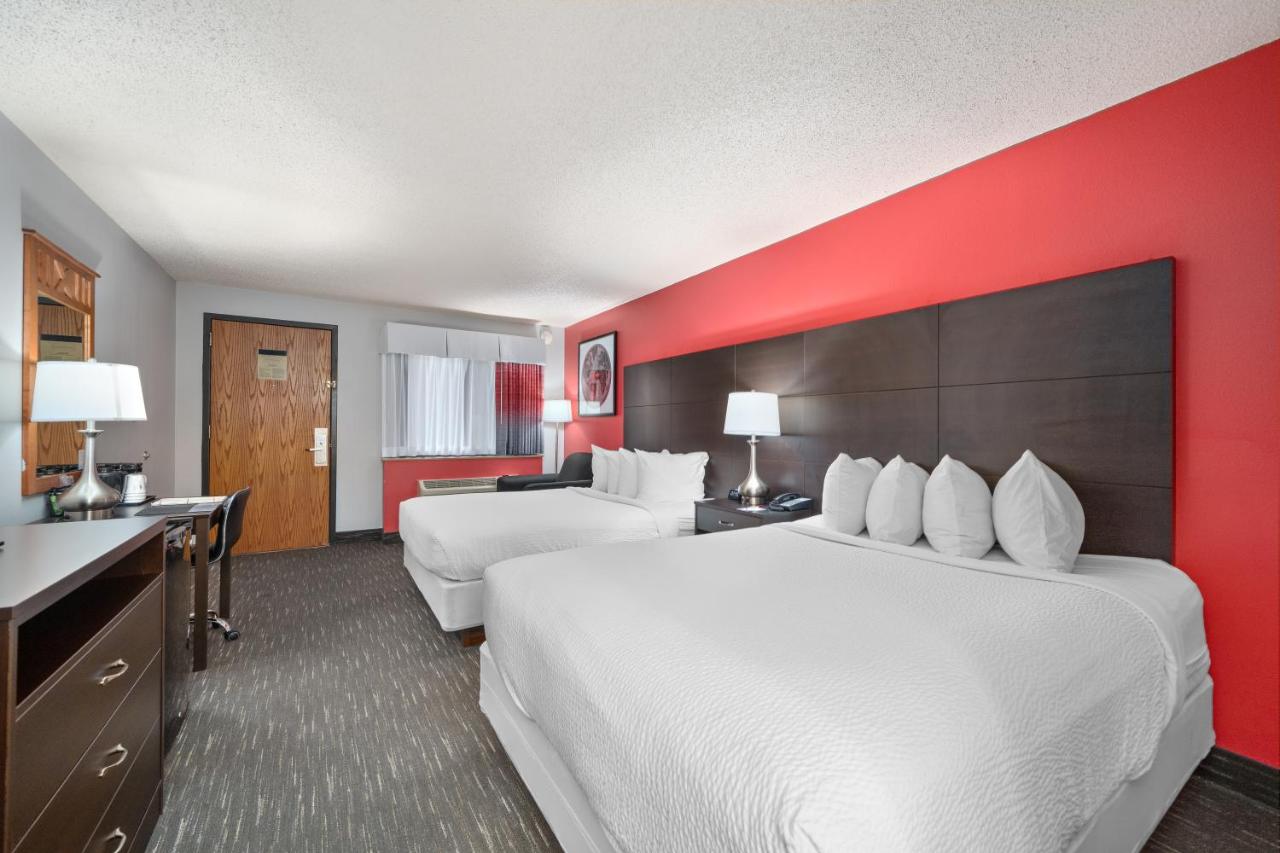 Queen Room with Two Queen Beds - Non-Smoking at Ramada by Wyndham Sioux Falls Airport - Waterpark Resort & Event Center