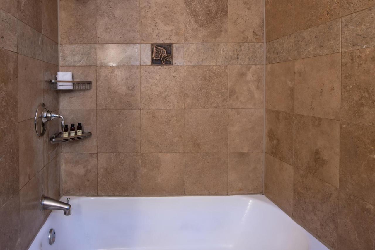 Deluxe One-Bedroom King Suite at La Posada de Santa Fe, A Tribute Portfolio Resort & Spa by Marriott