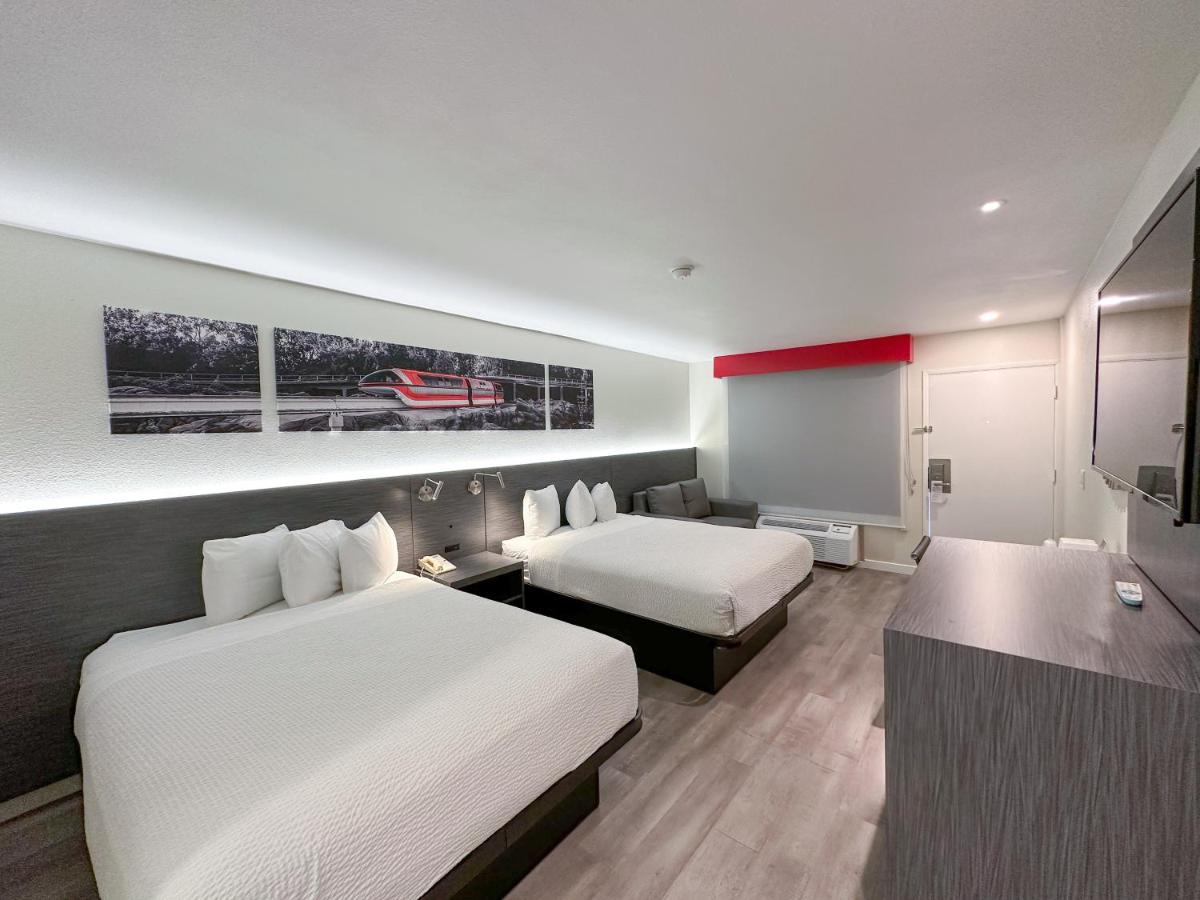 Queen Room with Two Queen Beds and Sofa Bed - Non-Smoking at Ramada by Wyndham Anaheim Convention Center