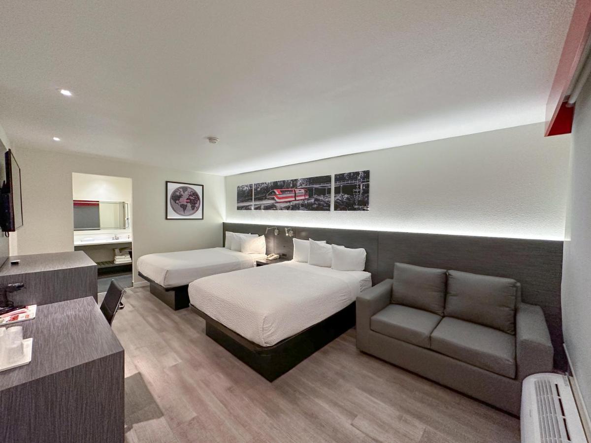 Queen Room with Two Queen Beds and Sofa Bed - Non-Smoking at Ramada by Wyndham Anaheim Convention Center