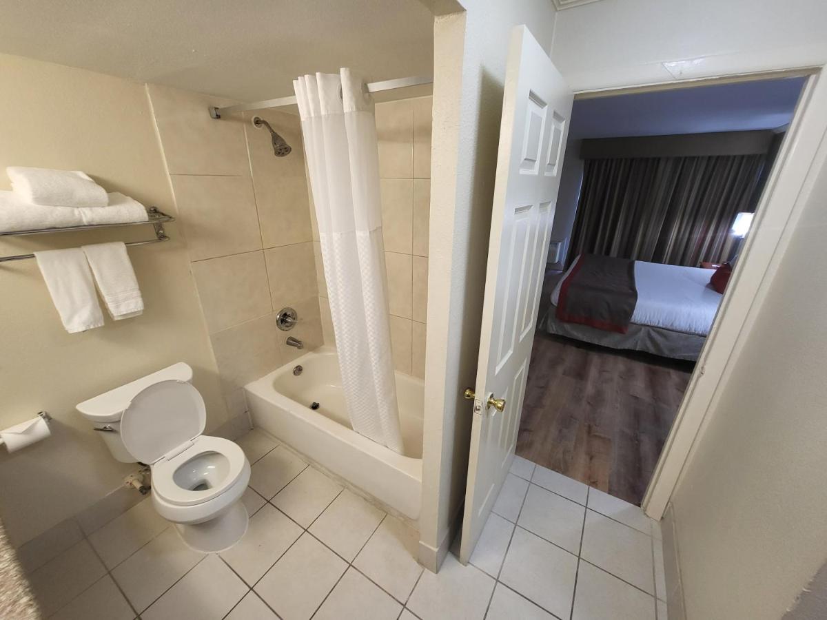 King Suite with Sofa Bed - Non-Smoking at Ramada by Wyndham Houston Intercontinental Airport East