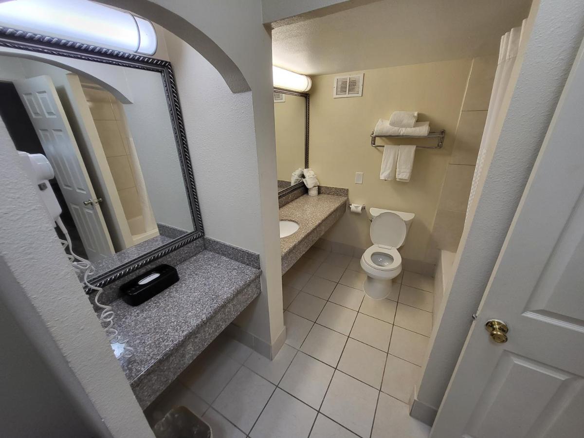 King Suite with Sofa Bed - Non-Smoking at Ramada by Wyndham Houston Intercontinental Airport East