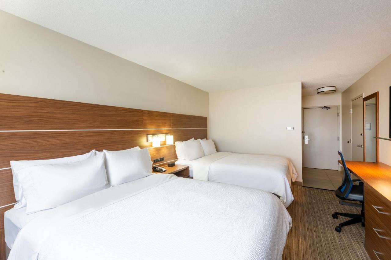 Queen Room with Two Queen Beds at Holiday Inn Express Cleveland-Vermilion, an IHG Hotel