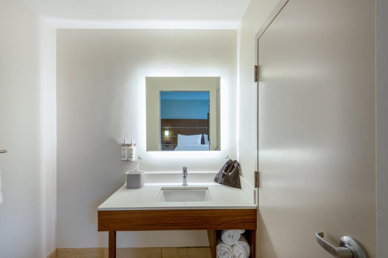 King Suite with Sofa Bed at Holiday Inn Express Cleveland-Vermilion, an IHG Hotel