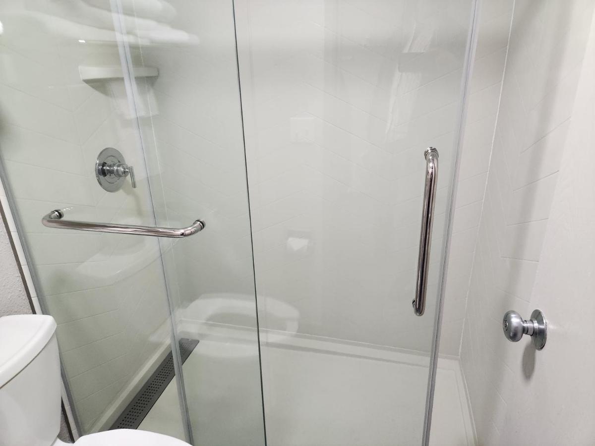 Queen Room with Two Queen Beds - Non-Smoking at Days Inn by Wyndham Sioux Falls Airport