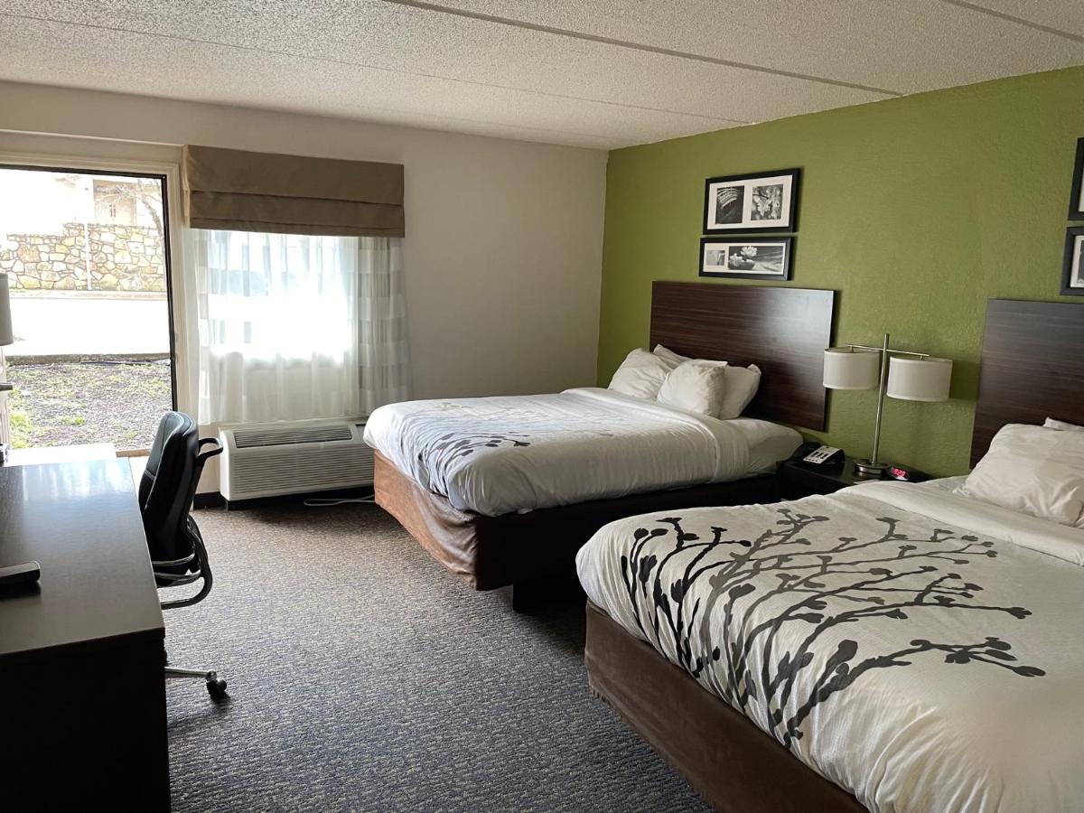 Queen Room with Two Queen Beds and Patio - Non-Smoking at Sleep Inn & Suites near Sports World Blvd