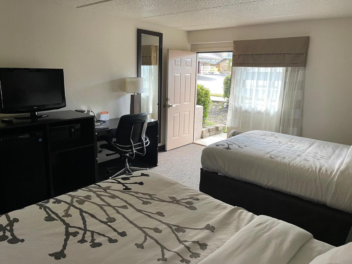 Queen Room with Two Queen Beds and Patio - Non-Smoking at Sleep Inn & Suites near Sports World Blvd