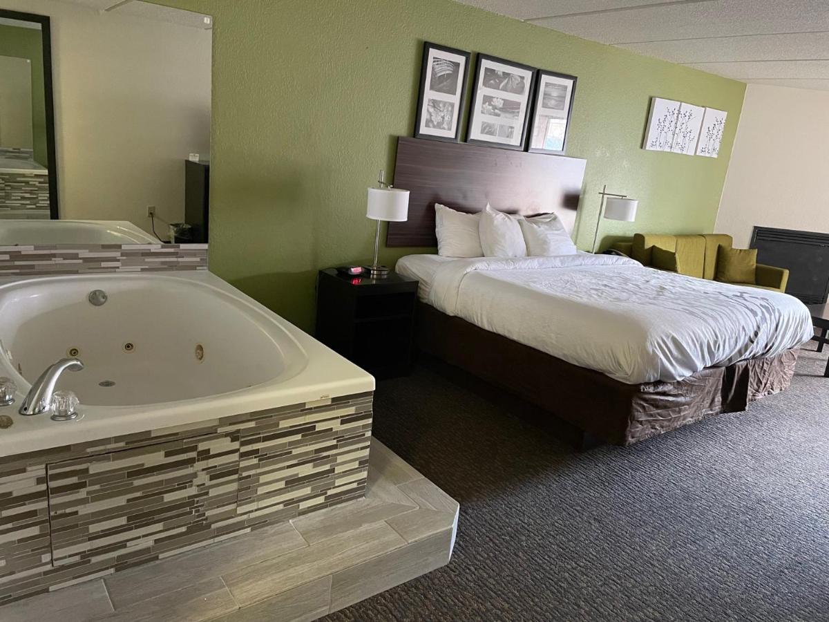 King Suite with Patio - Non-Smoking at Sleep Inn & Suites near Sports World Blvd