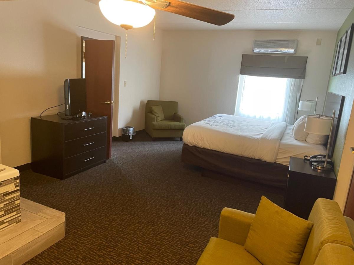 King Suite with Hot Tub - Non-Smoking at Sleep Inn & Suites near Sports World Blvd