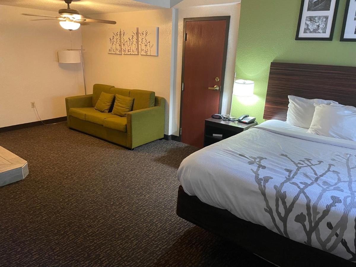 King Suite with Fireplace - Non-Smoking at Sleep Inn & Suites near Sports World Blvd