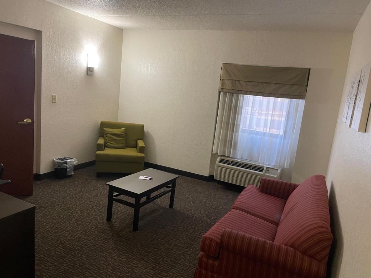 King Suite with Fireplace - Non-Smoking at Sleep Inn & Suites near Sports World Blvd