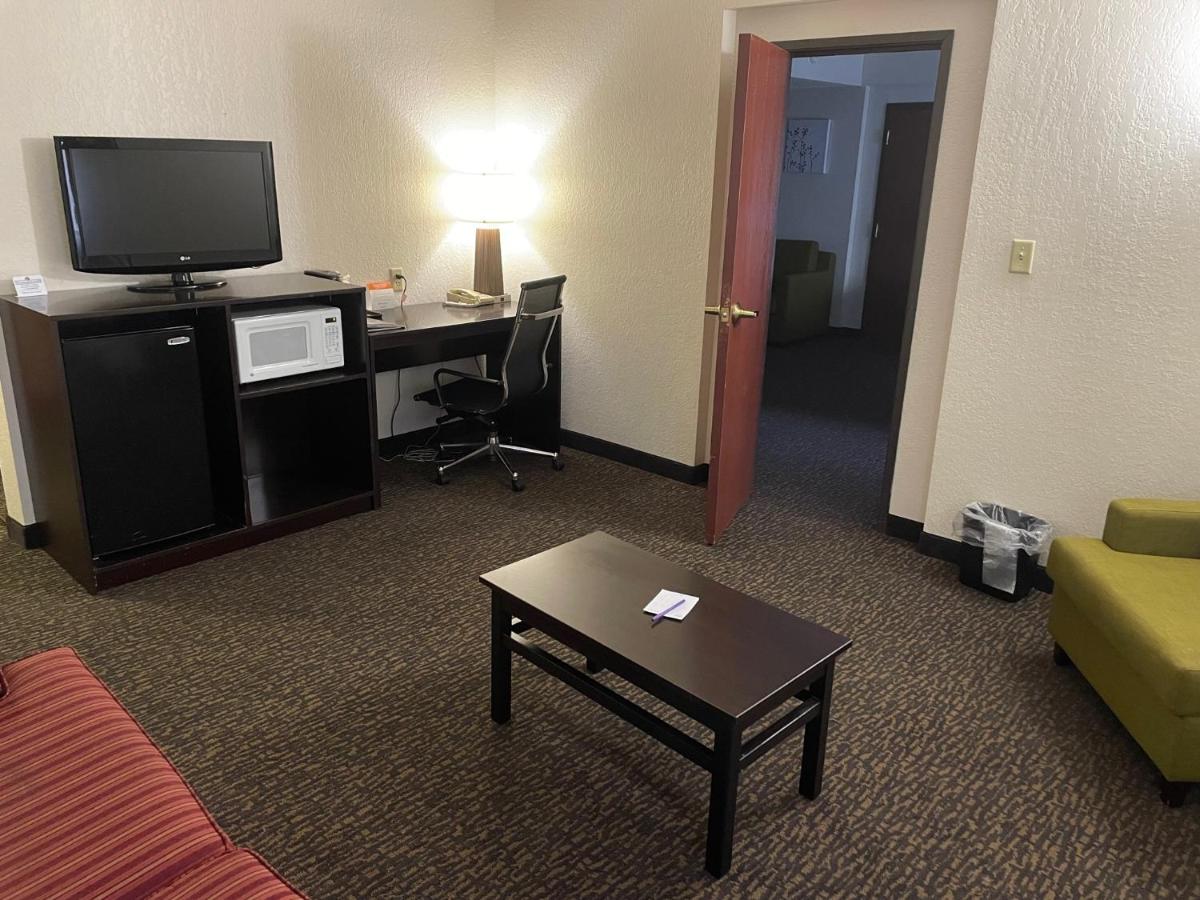 King Suite with Fireplace - Non-Smoking at Sleep Inn & Suites near Sports World Blvd