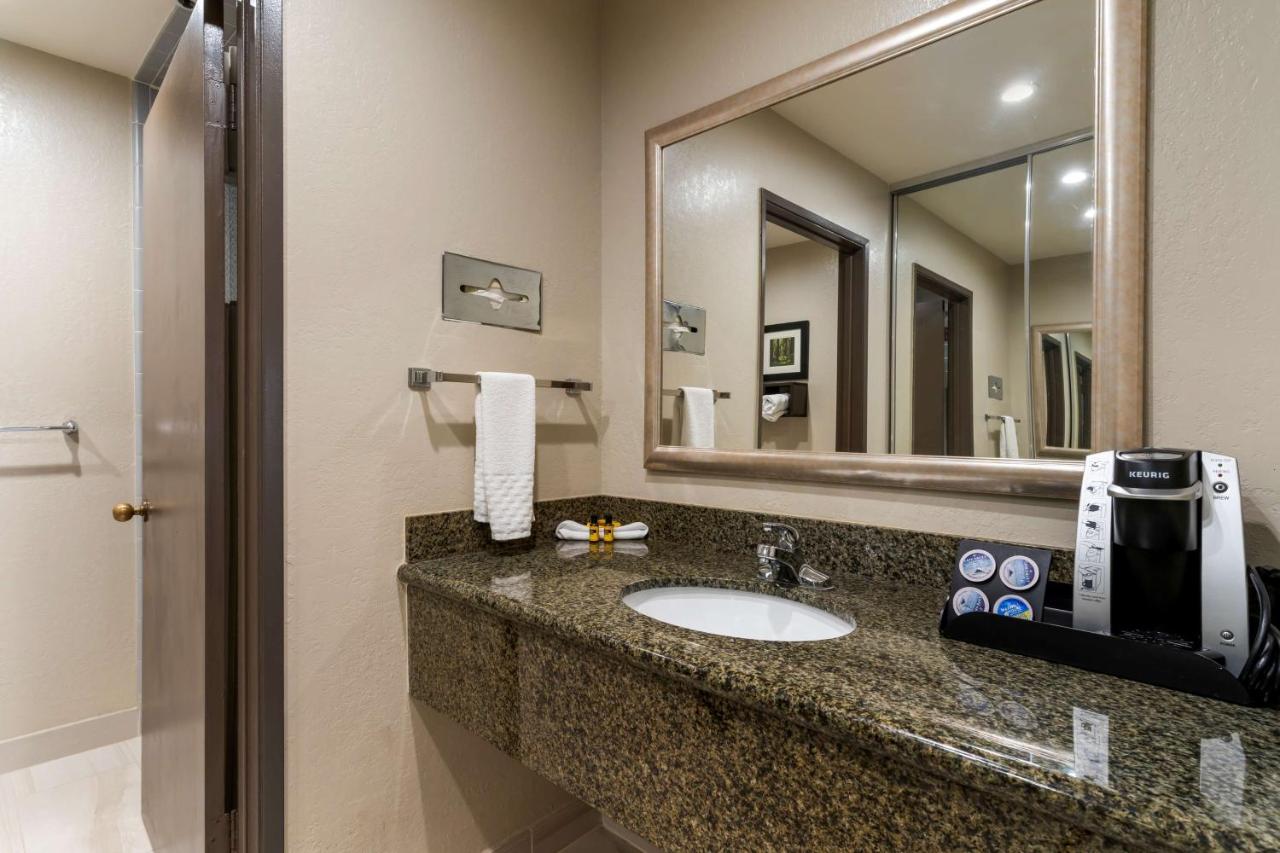 Queen Room with Two Queen Beds and Fireplace at Best Western Plus Forest Park Inn