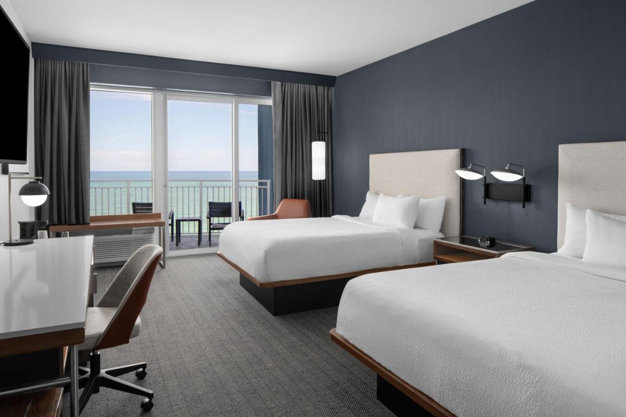 Queen Room with Two Queen Beds and Balcony - Oceanfront at Courtyard by Marriott Myrtle Beach Oceanfront