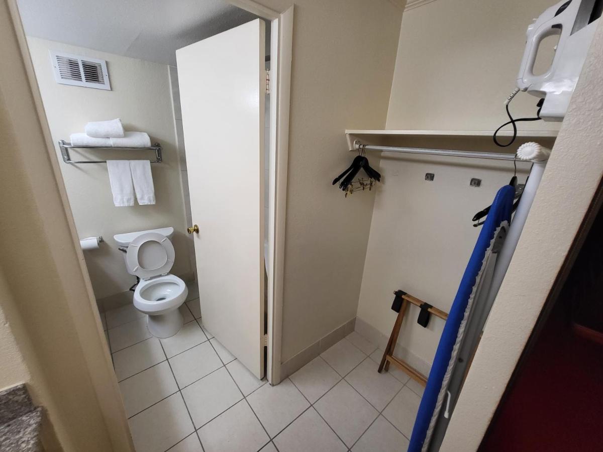 King Room with Roll-In Shower - Mobility Access/Non-Smoking at Ramada by Wyndham Houston Intercontinental Airport East