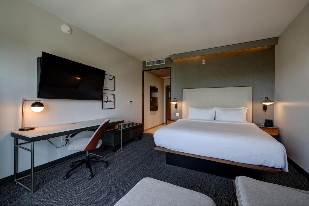 King Guest Room with Sofa Bed at Courtyard by Marriott Iowa City University Heights