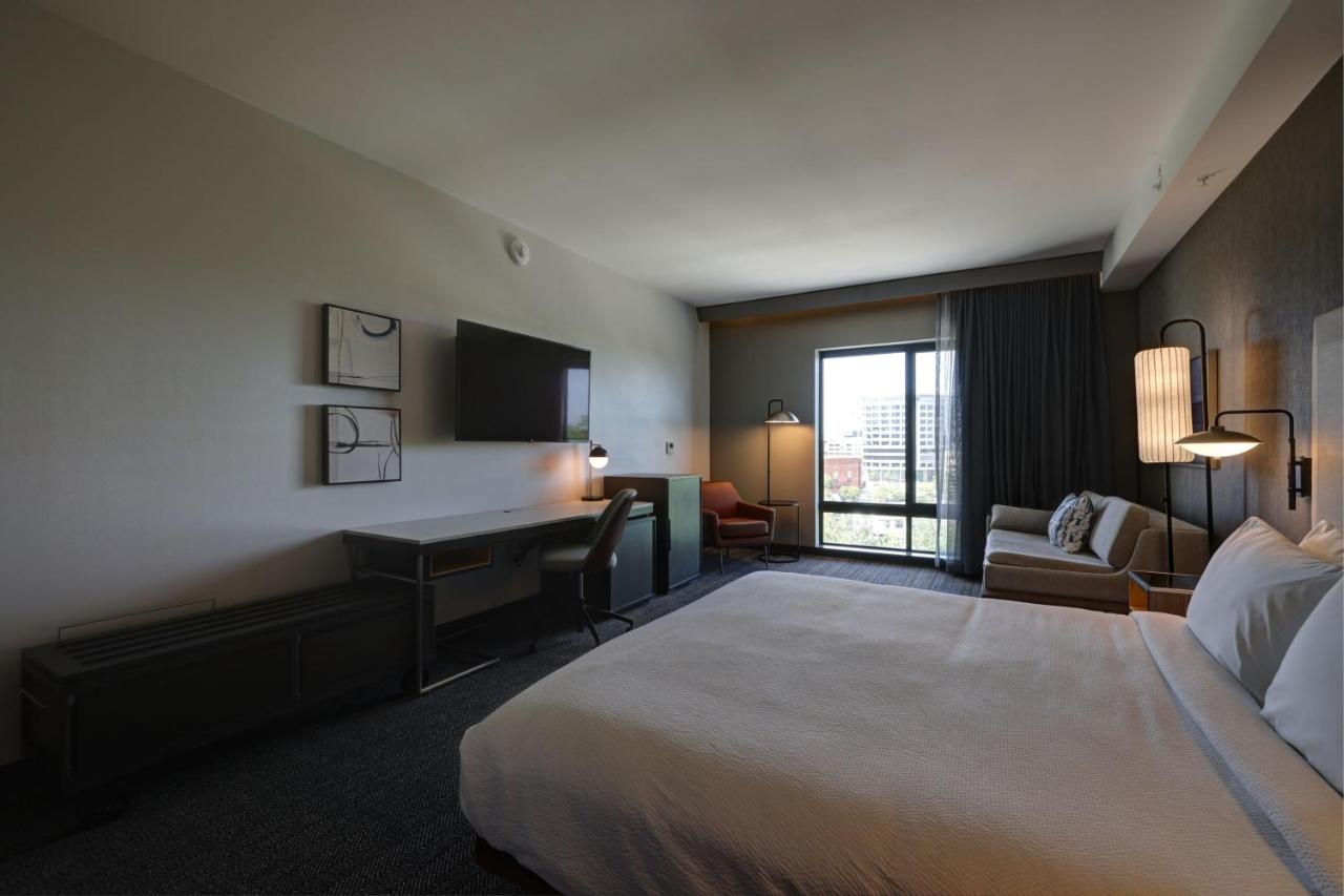 King Guest Room with Sofa Bed at Courtyard by Marriott Iowa City University Heights