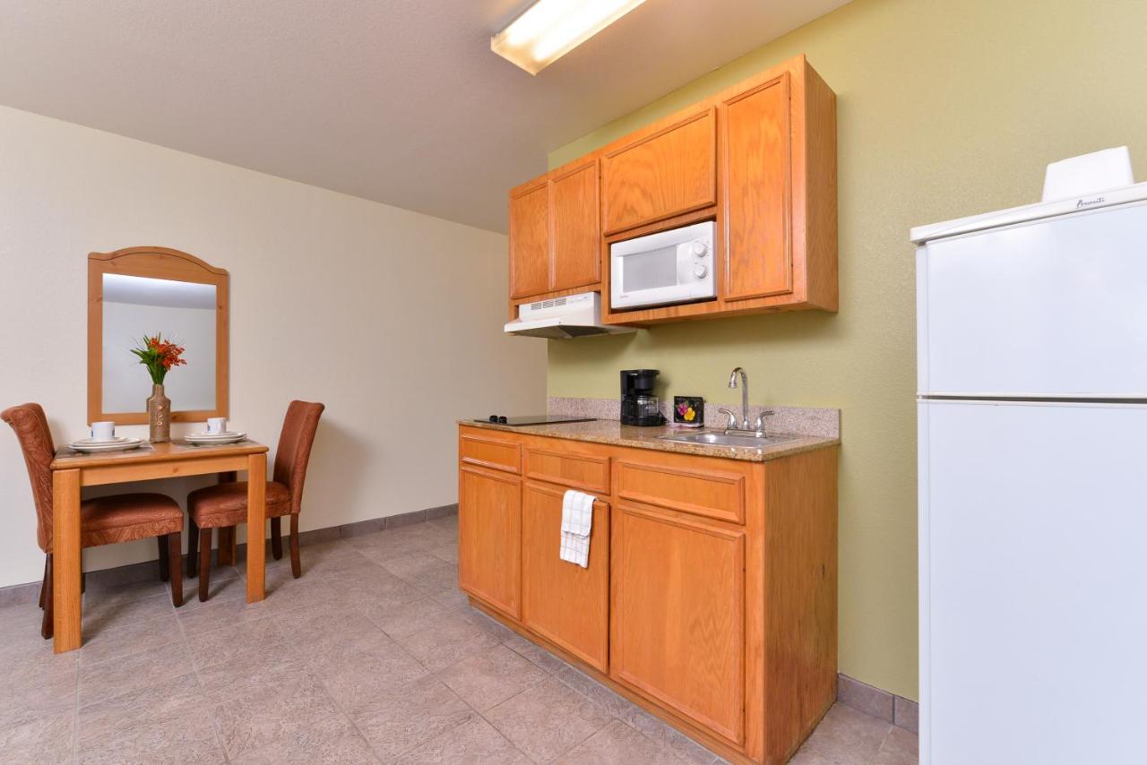 Deluxe King Suite with Sofa Bed at Americas Best Value Inn & Suites Winnie
