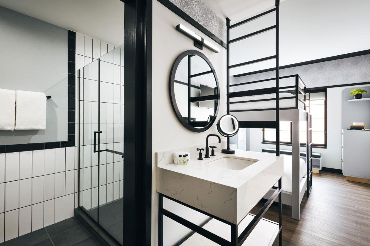 Guest room with 2 Queen bunk at Kinley Chattanooga Southside, a Tribute Portfolio Hotel