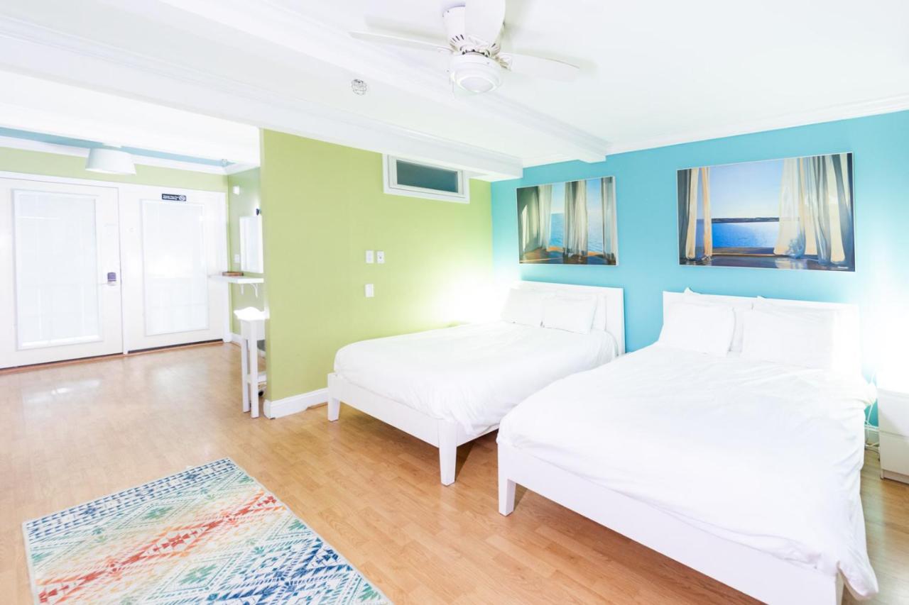 Quadruple Room with Balcony at Canalside Inn