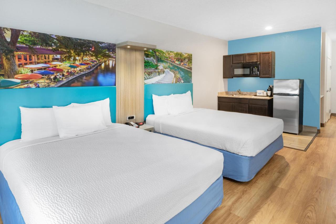 Queen Studio with Two Queen Beds - Mobility Accessible/Non-Smoking at Days Inn & Suites by Wyndham San Antonio near Frost Bank Center