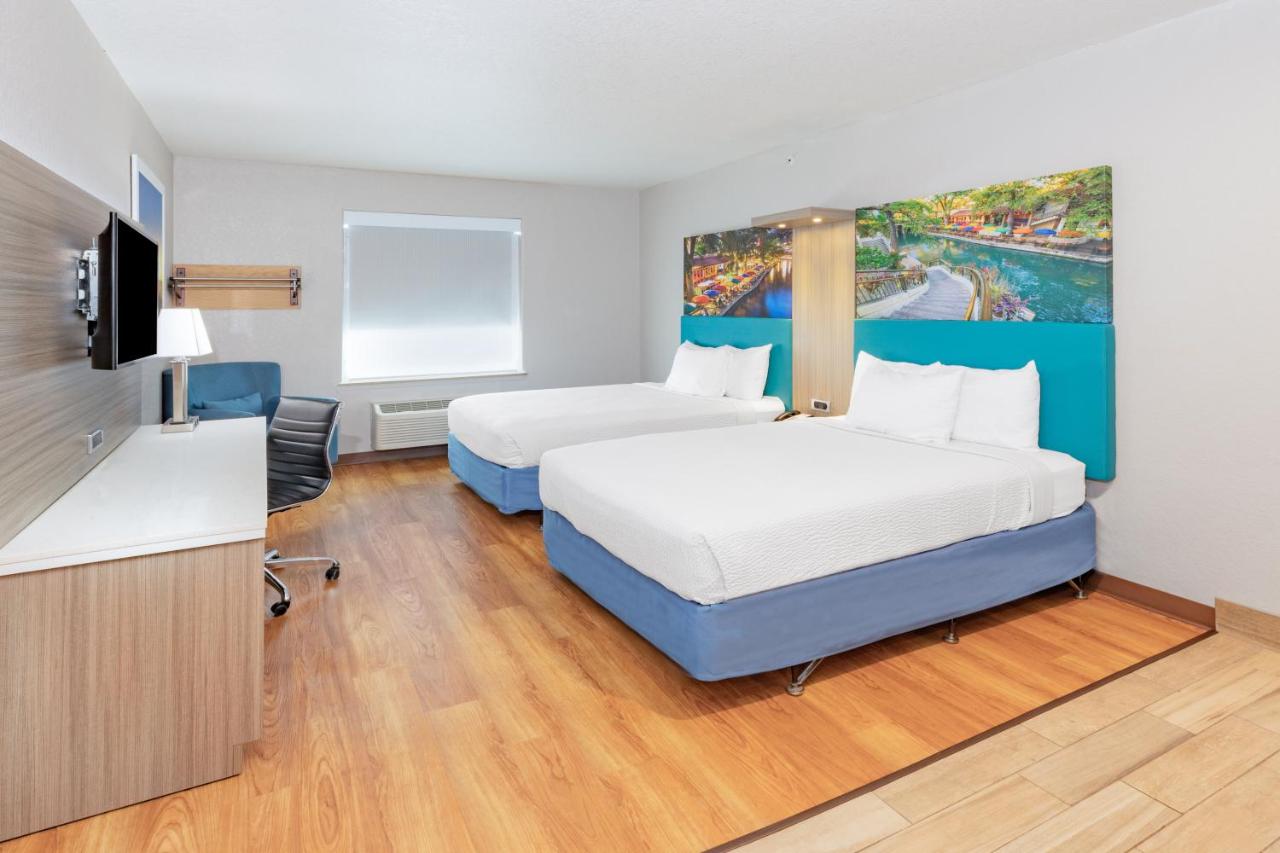 Queen Studio with Two Queen Beds - Mobility Accessible/Non-Smoking at Days Inn & Suites by Wyndham San Antonio near Frost Bank Center