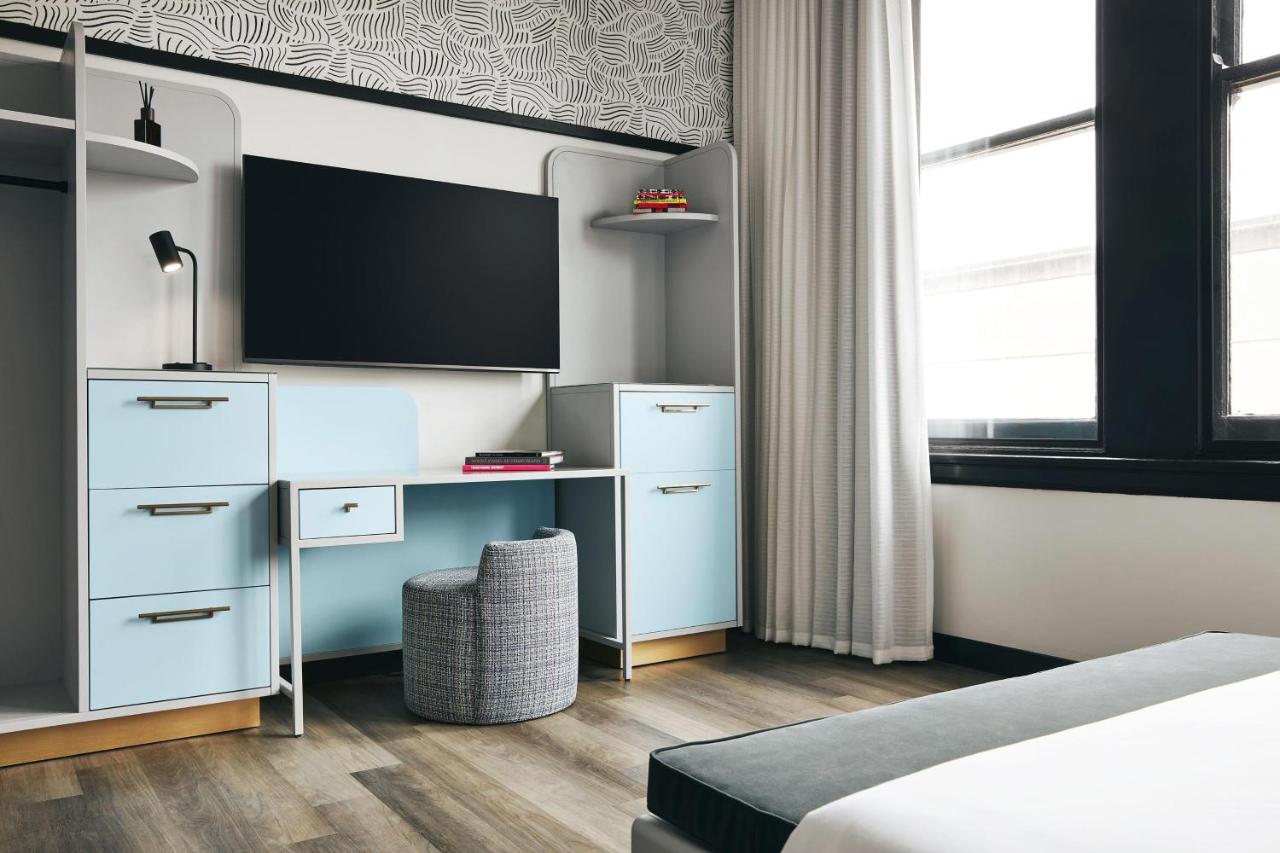 King Room with Roll-in Shower - Mobility and Hearing Accessible at Kinley Cincinnati Downtown, a Tribute Portfolio Hotel