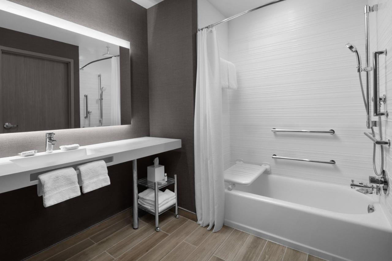 Queen Room with Two Queen Beds and Pool View - Hearing Accessible at AC Hotel by Marriott Miami Dadeland
