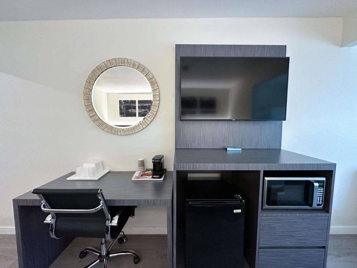Queen Room with Two Queen Beds and a Bunk Bed - Non-Smoking at Ramada by Wyndham Anaheim Convention Center