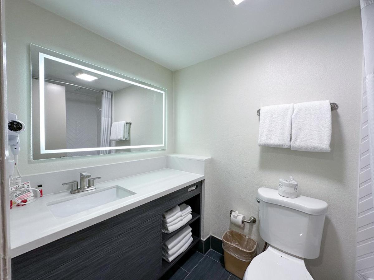 Queen Room with Two Queen Beds and a Bunk Bed - Non-Smoking at Ramada by Wyndham Anaheim Convention Center
