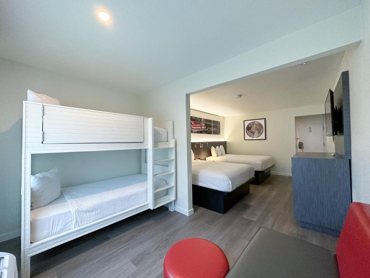 Queen Room with Two Queen Beds and a Bunk Bed - Non-Smoking at Ramada by Wyndham Anaheim Convention Center