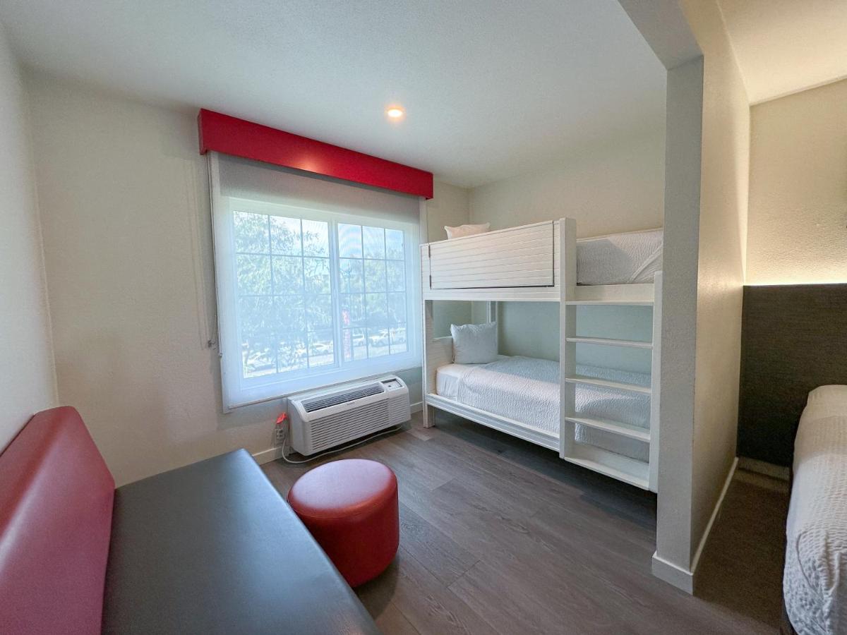 Queen Room with Two Queen Beds and a Bunk Bed - Non-Smoking at Ramada by Wyndham Anaheim Convention Center