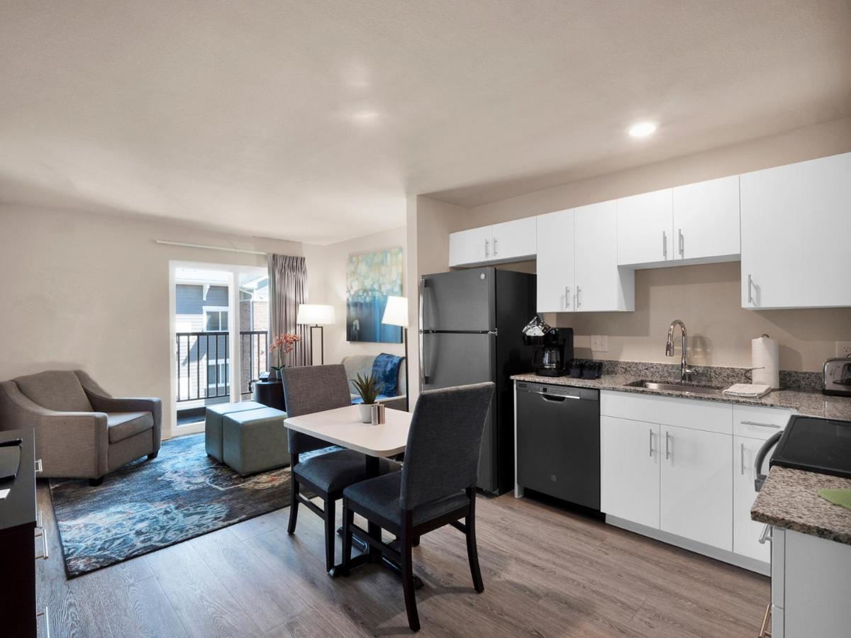 One-Bedroom Queen Suite with Balcony at WaterWalk Extended Stay by Wyndham Charlotte - Arrowood