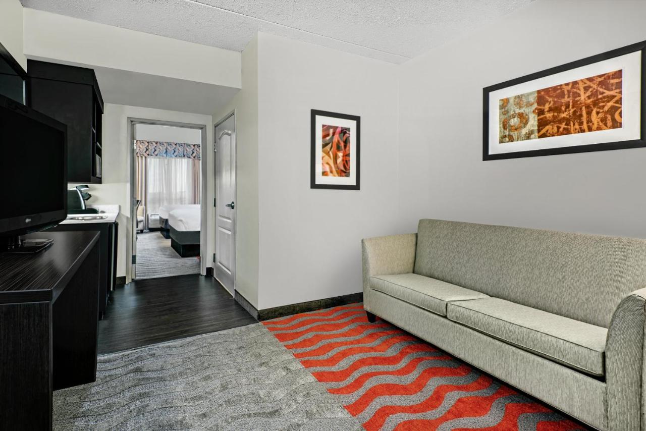 Queen Room with Two Queen Beds Suite - Non-Smoking at Holiday Inn & Suites College Station - Aggieland by IHG