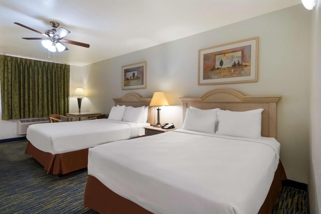 Oversized Queen Room with Two Queen Beds at SureStay Hotel by Best Western Falfurrias