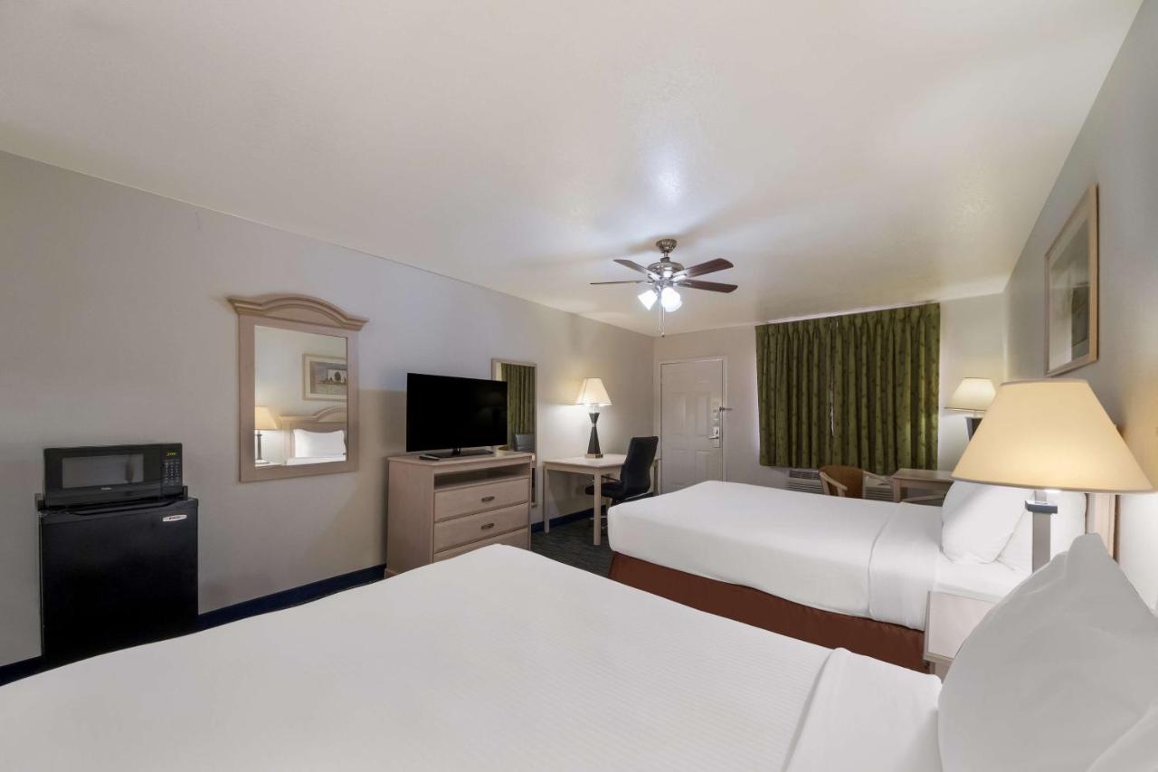 Oversized Queen Room with Two Queen Beds at SureStay Hotel by Best Western Falfurrias