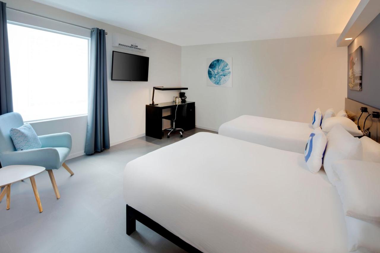 Queen Room with Two Queen Beds - Non-Smoking at MB Hotel, Trademark Collection by Wyndham